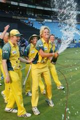 Emma Liddell sprays champagne as Australia's World Cup celebrations begin © AFP
