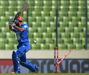 Afghanistan opener Nawroz Mangal was bowled for 5 against India in Mirpur © AFP