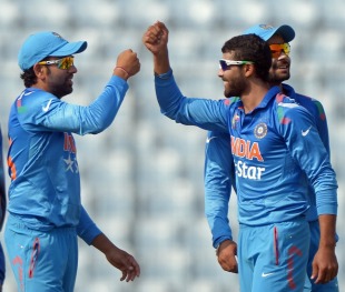Ravindra Jadeja cut through Afghanistan's top order and finished with 4 for 30 in Mirpur © AFP