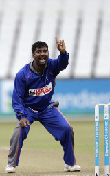 Muttiah Muralitharan and his team-mates gave Asia XI a great chance but rain abandoned the third Afro-Asian ODI at Durban © AFP
