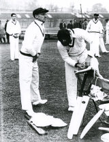 Don Bradman, 'box' in position, prepares to tune up in the nets at the start of the tour &copy; Wisden Cricket Monthly
