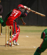 Abdool Samad drives on his way to 50 as Canada beat Kenya in the final match &copy; Eddie Norfolk